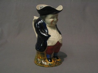 A 20th Century Toby jug in the form of a standing Toby Philpots  9 1/2"