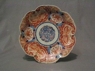 A 19th Century Japanese Imari porcelain plate with lobed body and panel decoration 12" (f and r)