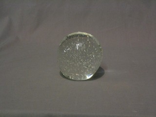 A large clear bubble glass paperweight, 4 1/2"