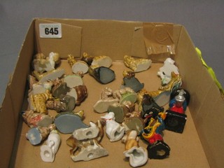 25 various Wade Whimsies, 2 Robinson Gollywog band members, a miniature figure of a dog, ditto deer and faun, do. white dog and a parrot
