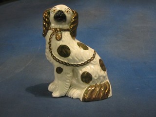 A 19th Century Staffordshire figure of a seated spaniel 9"