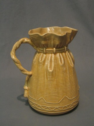 A brown glazed Sylvac pottery vase in the form of a drawstring bag, base marked 406 8"