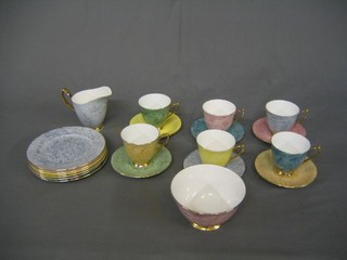 A 14 piece Royal Albert Gossamer tea service comprising 6 cups and saucer, cream jug, sugar bowl and 6 tea plates