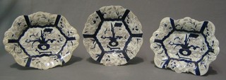 A 21 piece Victorian Masons Ironstone china dessert service comprising 3 twin handled dishes 11", 4 twin handled dishes 10", 14 circular plates 9" (1 cracked, 1 with slight chip), the base with purple Patented Masons Ironstone china mark