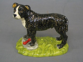 A Royal Doulton figure of a Staffordshire Bull Terrier 5 1/2"