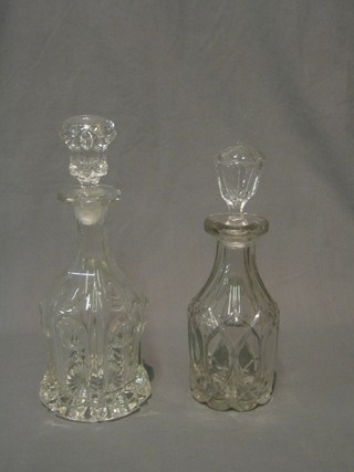 2 cut glass mallet shaped decanters