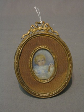 A 19th Century ivory portrait miniature of a small girl with doll 2" oval