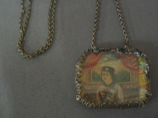 An Eastern silver cased pendant, one side decorated a portrait of a noblewoman the other a mirror