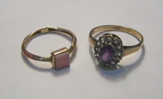 A lady's gold signet ring set a square cut pink stone and a dress ring set purple and white stones