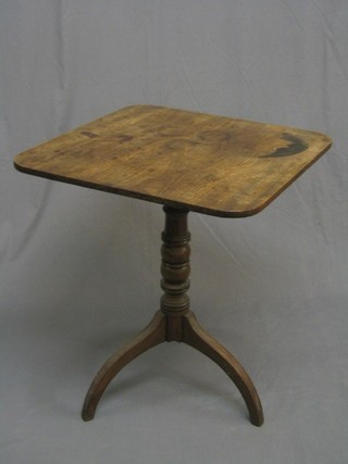 A 19th Century rectangular snap top breakfast table, raised on a turned column and tripod base 24" (some old staining to top)