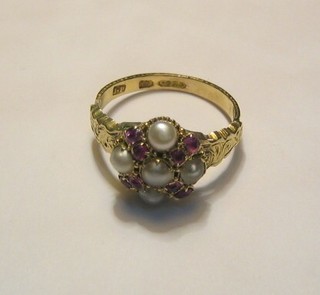 A lady's Edwardian gold dress ring set demi-pearls and garnets