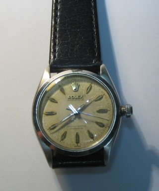 A gentleman's Rolex Oyster perpetual wristwatch contained in a chromium plated case ref 6564-190011