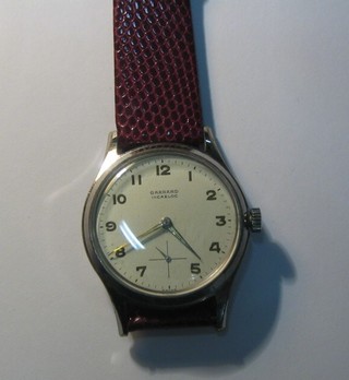 A gentleman's wristwatch by Garrards, contained in a stainless steel case