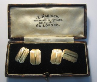 A pair of 9ct gold cufflinks, cased