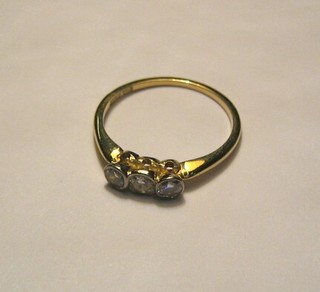 A lady's 18ct gold engagement ring set 3 diamonds
