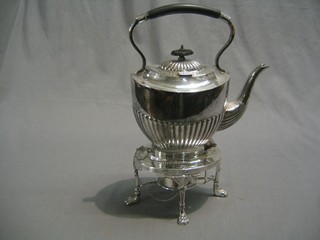 A silver plated tea kettle and stand with demi-reeded decoration  complete with burner