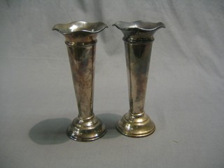 A pair of silver plated hotelware trumpet shaped vases 8"
