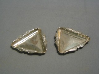 A pair of triangular silver pin trays, London 1964