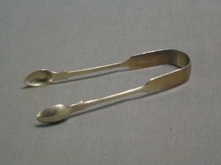 A pair of Victorian silver fiddle pattern sugar tongs, London 1853