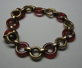 A gold and cornelian multi link bracelet