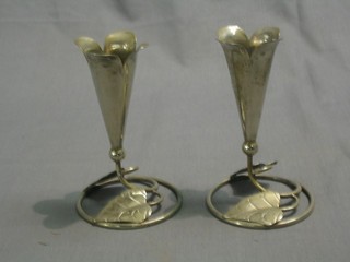 A pair of silver plated specimen vases supported by leaves 5"