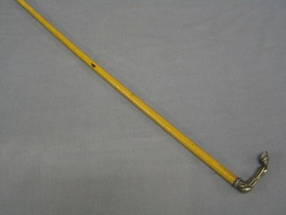 A lady's 19th Century melacca walking cane, the handle in the form of a crooked horses leg and hoof