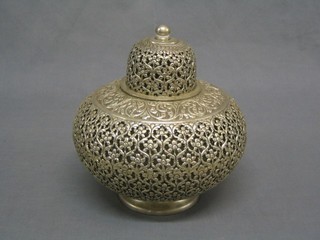 An Eastern pierced white metal jar and cover, the base marked silver 925