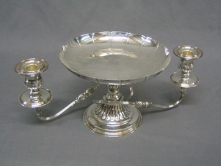 A silver plated table centre piece incorporating a candelabrum