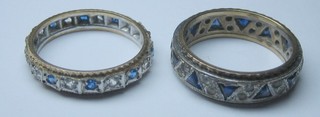 2 lady's gilt metal eternity rings set white and blue stones