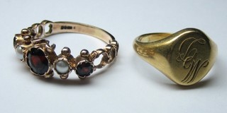 A lady's gold dress ring set garnets and pearls and a lady's 18ct gold signet ring