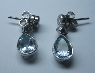 A pair of aquamarine and diamond teardrop earrings (0.6/2ct)