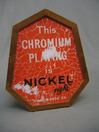 A table mounted glass and teak advertising sign for "The Chromium Plated is Nickelright"
