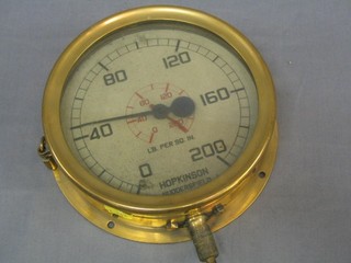 A circular brass pressure gauge by Hopkinsons of Huddersfield marked lb per square inch 0 - 200, 7 1/2"