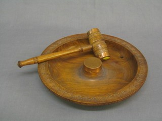 A turned Eastern circular nut bowl complete with gavel cracker 11"