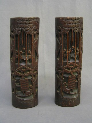 A pair of carved bamboo vases decorated figures 13"