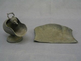 A pewter sugar scuttle, an embossed copper crumb tray and a small Devonware pottery salt pot