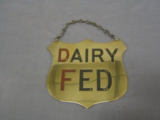 A 19th Century brass shield shaped butcher's Dead Stock sign, marked Dairy Fed 7 1/2"