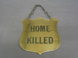 A 19th Century brass shield shaped butcher's Dead Stock sign, marked Home Killed, 7 1/2"