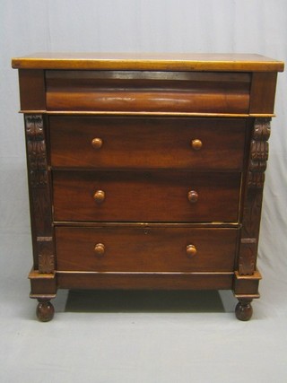A Victorian Cumberland or Scots Baronial mahogany chest fitted a secret drawer and 3 long drawers with tore handles, flanked by a pair of carved columns 44 1/2"