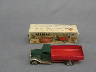 A Triang Minic model clockwork  of a flat bed truck (wheels perished, 1 wheel off), boxed