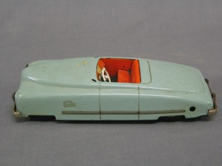 A JMF Favorit tin plate clock work model car (windscreen missing) 9 1/2"