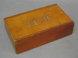 A bamboo Mah Jong set, boxed