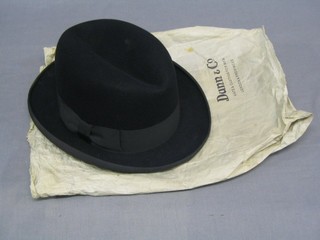 A gentleman's Dunn's black size 7 Homburg hat complete with original paper bag