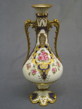 A fine quality Wedgwood gilt twin handled vase decorated roses, the base marked Z.3443 10 1/2"
