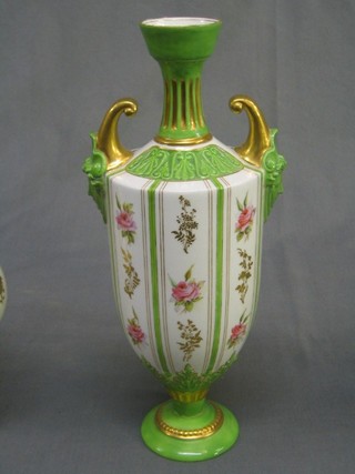 A Royal Worcester green glazed porcelain twin handled vase, the base with black Worcester mark, 4 dots, RD no. 238835 1759, 10", slight damage to rim, base f & r,   