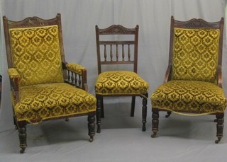An Edwardian carved mahogany show frame drawing room suite comprising armchair, nursing chair and 2 standard chairs with bobbin turned decoration