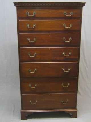 A 20th Century Georgian style pedestal chest with moulded and dentil cornice, fitted 7 long drawers with brass swan neck handles, raised on bracket feet, 32"