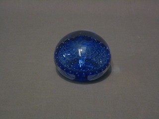 A "Channel Islands" blue glass paperweight, the base with castle seal 4"