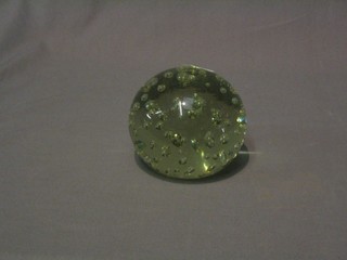 A large clear bubble glass paperweight 4"