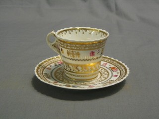 A 19th Century Chamberlain's Worcester cup and saucer with floral decoration and gilt banding